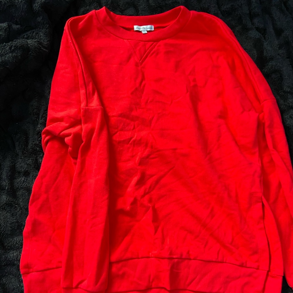 Red sweatshirt with side slits